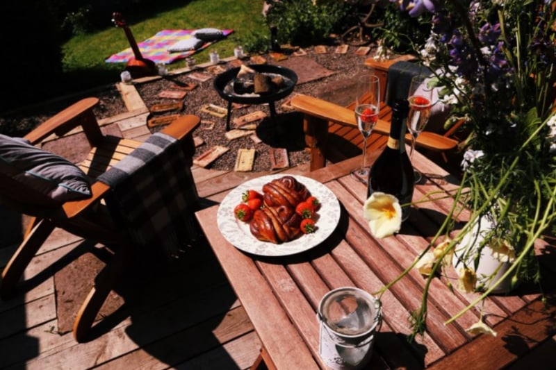 The decking area comes with a barbecue and is ideal for outdoor meals.