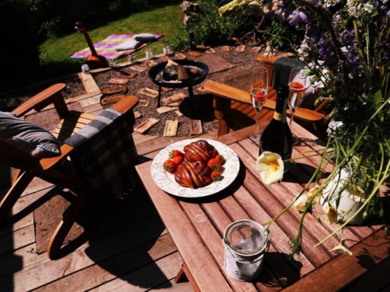 The decking area comes with a barbecue and is ideal for outdoor meals.