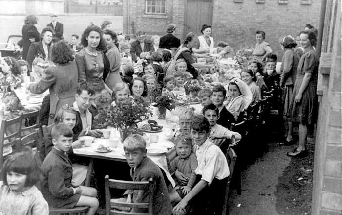 Superb image provided by Lynne Dawkins showing an end of war celebration in 1945 at Fulbridge School.
“This is in the playground of Fulbridge School and was for the children of the surrounding streets," said Lynne. "My mum (Gwyneth) is standing left, facing the camera. In front of her, seated, are her cousins Alan and Elaine Green, then her brothers Albert and Bryn, ?? and then her sister, Iris Hancocks. Some more names..., Audrey Swann, Bunty Woods, Pam Hornsby, Betty Swann, Brenda Sharpe, ? Wilson, ? Faulkner. Tony and Roger Runacre, whose father worked at Central Park …. he used to ring a bell to let people know the park was closing and then would lock all the gates. My Nan, Freda, is on the right standing and in the background is a bomb shelter.” (image: Lynne Dawkins )