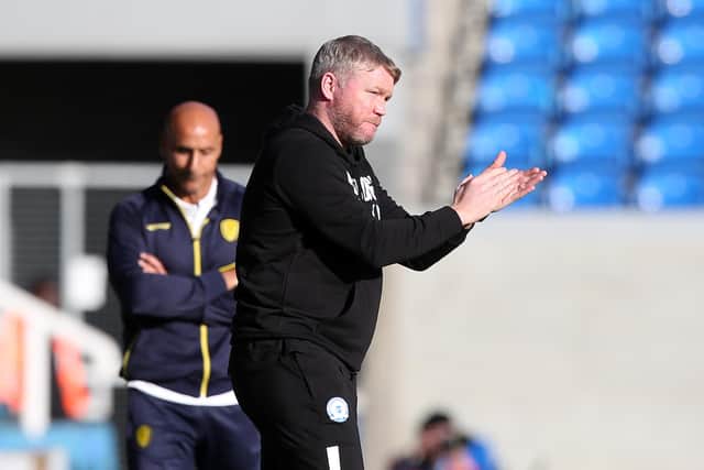 Peterborough United Manager Grant McCann encourages his players against Burton Albion. Photo: Joe Dent.