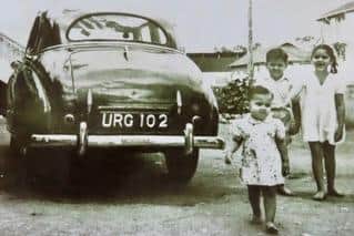Akbar Vohra as a child with older siblings sister Gulshan and brother Farook