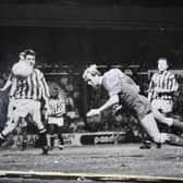 Steve Cooper scores the winning goal for Posh in a famous Third Division play-off semi-final second leg tie at Huddersfield in 1992.