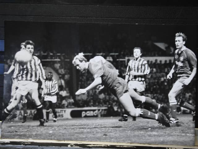 Steve Cooper scores the winning goal for Posh in a famous Third Division play-off semi-final second leg tie at Huddersfield in 1992.
