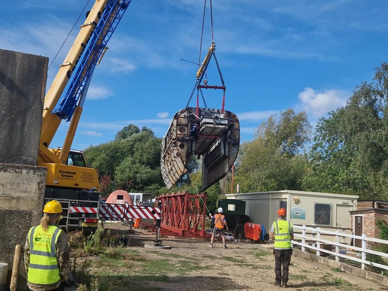 The vehicle had been cut in half to make the lift possible