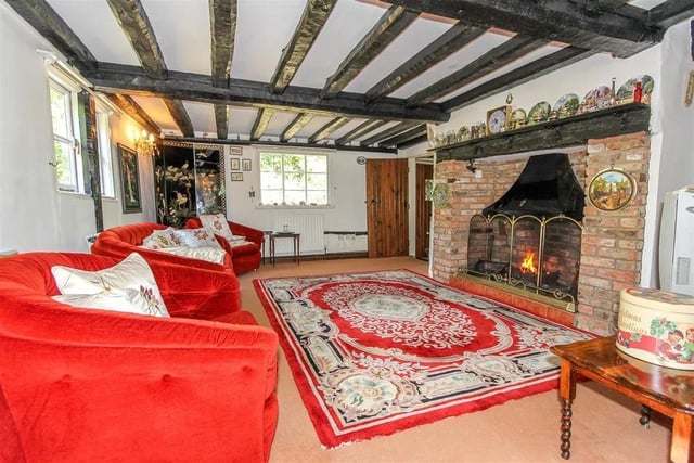 Grade II listed part-thatched cottage for sale in the pretty village of Conington