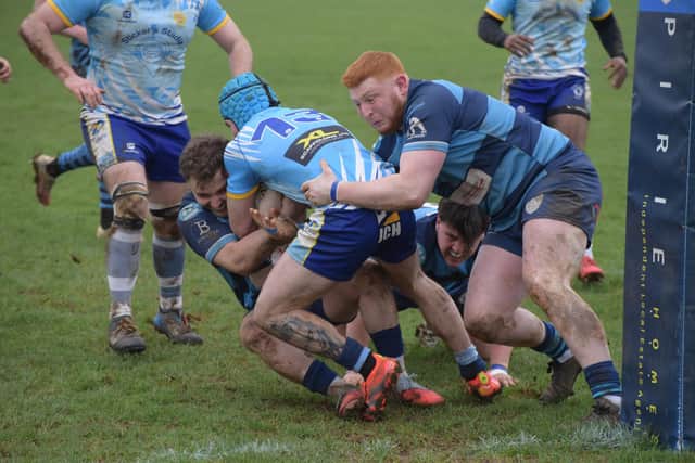 Action from Peterborough Lions (light blue) at St Neots. Photo Kevin Goodacre.