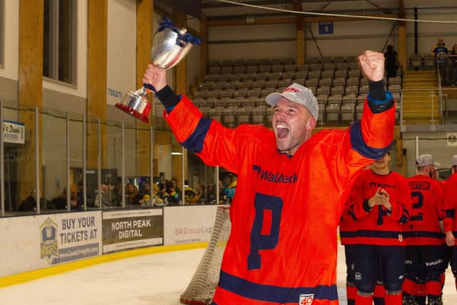 Joe Gretton celebrates National League Cup success with Phantoms last season. Photo: Paul Young.