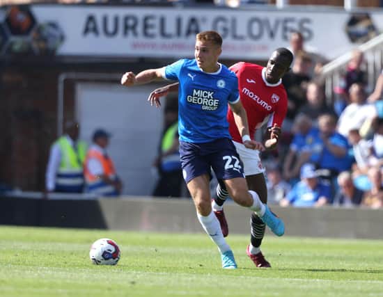 Hector Kyprianou in action for Posh against Morecambe. Photo: Paul Marriott.