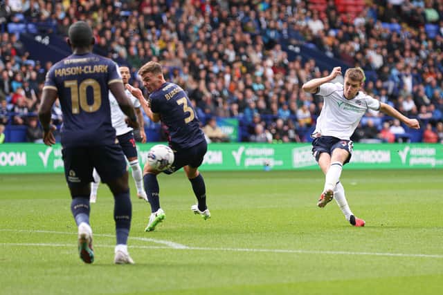 Action from Bolton v Posh as George Thomason shoots on goal for the home side.. Photo by Paul Currie/Shutterstock.