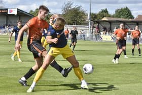 Action from Peterborough Sports (orange) v Spennymoor Town. Photo: David Lowndes.