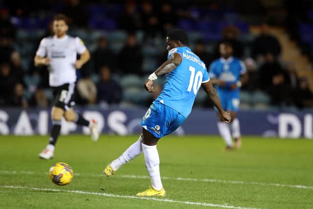 Ephron Mason-Clark of Peterborough United scores for Posh at Crawley. Photo: Joe Dent/theposh.com.