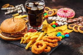 Peterborough City Council will consider banning junk food advertising on its properties and advertising spaces