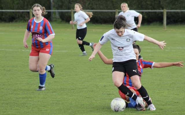 Jess Driscoll on the ball for Posh Women.