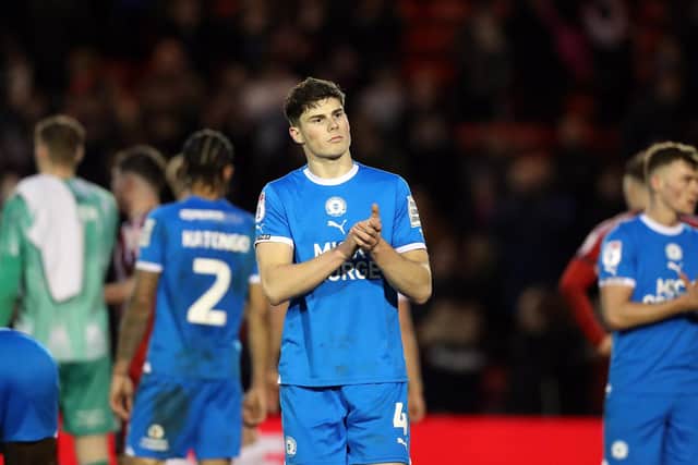 Ronnie Edwards applauds the Posh fans after the 0-0 draw with Lincoln. Photo: Joe Dent/theposh.com.