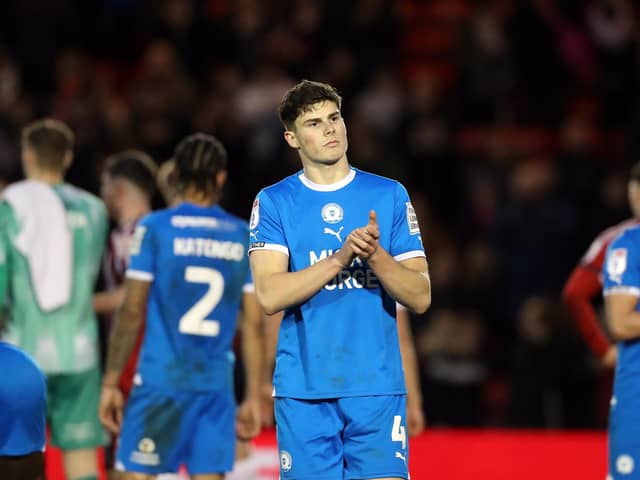 Ronnie Edwards applauds the Posh fans after the 0-0 draw with Lincoln. Photo: Joe Dent/theposh.com.