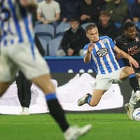 Peterborough United picked off by three old boys in tough night at Huddersfield Town