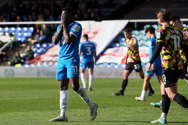 Kwame Poku of Peterborough United rues a missed chance to score against Carlisle United. Photo: Joe Dent.