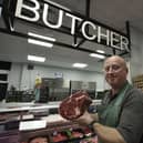 Butcher Phil Woodland, shortly to retire at the  Bridge street indoor market.
