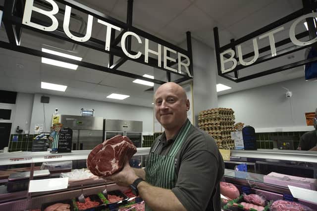 Butcher Phil Woodland, shortly to retire at the  Bridge street indoor market.