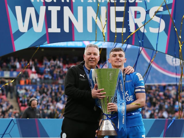 Harrison Burrows with manager Darren Ferguson after the EFL Trophy Final win at Wembley.