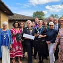 Friends of Stamford Hospital make their final donation.