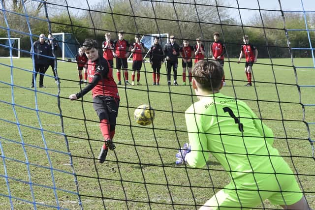 Netherton convert a penalty in their Under 14 League Cup Final success against Thorpe Wood Rangers. Photo: David Lowndes,