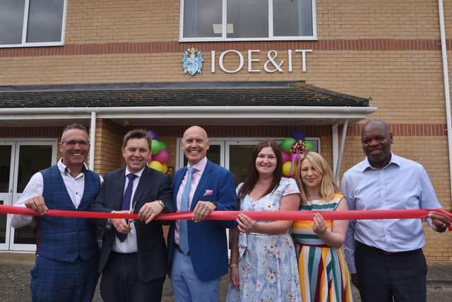 Institute of Export and International Trade opening their new offices at Minerva Business Park. Mayor of Peterborough and Cambridgeshire Dr Nik Johnson with  Matty Rawles amd Marco Forgione cut the ribbon.