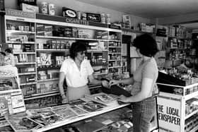 This great snap shows a traditional 1980s corner shop. Cigarettes, tobacco and cigars proudly on sale, as was the norm for the era.