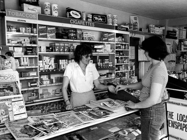 This great snap shows a traditional 1980s corner shop. Cigarettes, tobacco and cigars proudly on sale, as was the norm for the era.