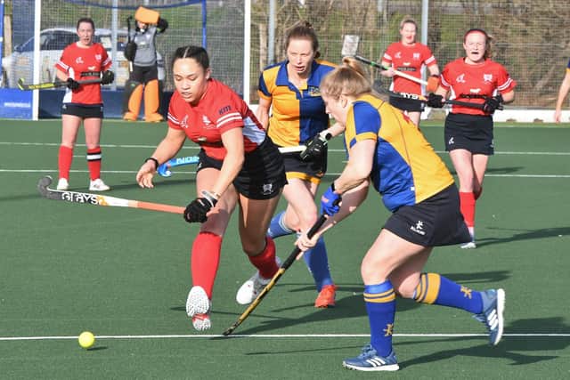 Tierney Augustine (red) in action for City of Peterborough. Photo David Lowndes.