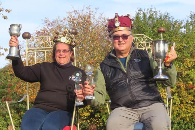 Women's world conker champ Fee Aylmore alongside men's champion Randy Topolnitsky (image: StJohn Burkett)