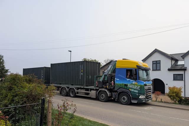 A container lorry passes through Eye