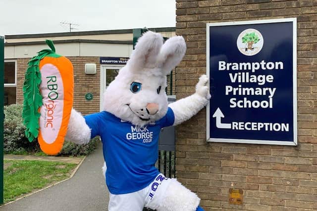 Posh mascot Peter Burrow at a local school