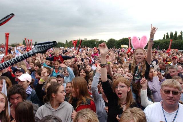 Busted and co performing in concert on The Embankment