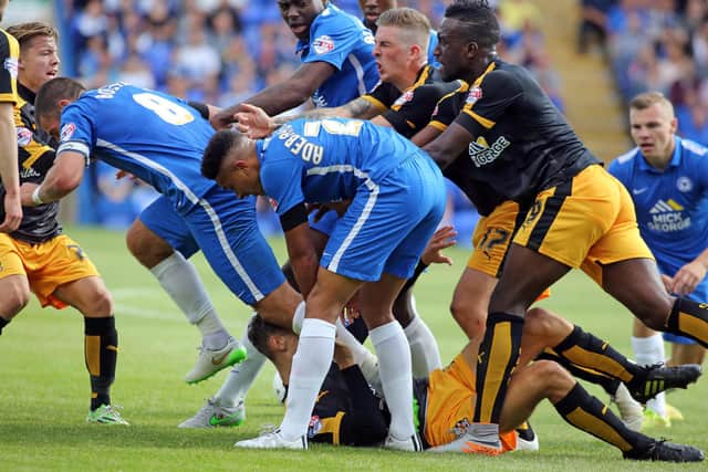 A Posh v Cambridge United tussle in 2015.