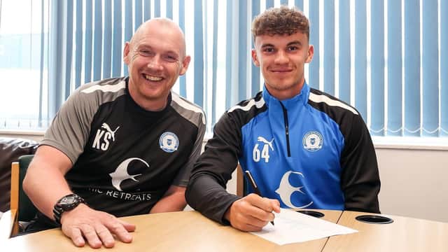 Janos Bodnar (right) after signing a professional development contract with Posh in August, 2022. Photo Joe Dent/theposh.com