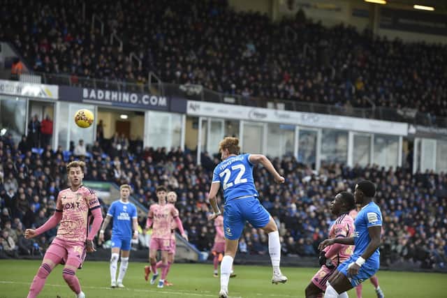 Hector Kyprianou heads wide for Posh against Leeds. Photo: David Lowndes.