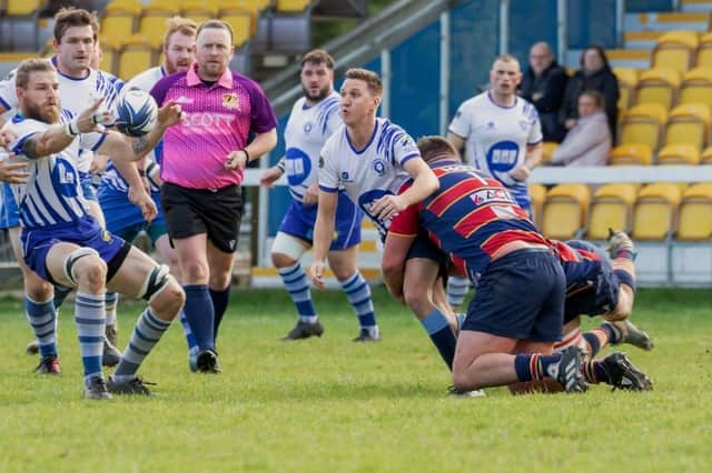 Peterborough Lions (white) in action against Old Northamptonians. Photo: Mick Sutterby.