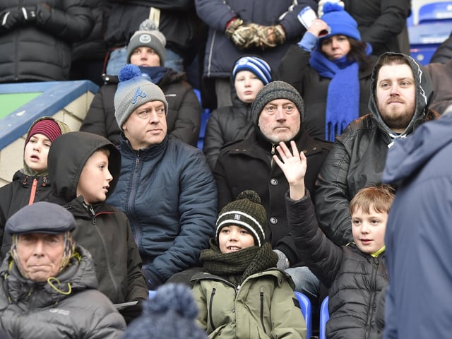 Peterborough United fans watch the 2-1 FA Cup win over Doncaster Rovers.