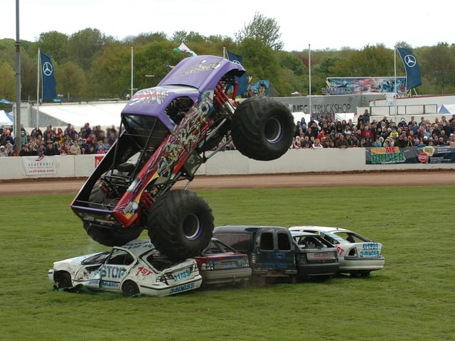 Monster truck, Slingshot, does what it does best in the main arena at Truckfest 2010.