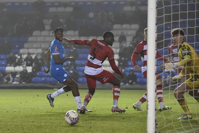 Posh striker Ricky-Jade Jones steered this opportunity wide of the Doncaster goal. Photo: David Lowndes.