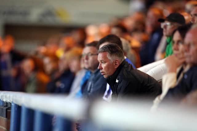 Darren Ferguson watches on from the stands against Cambridge United. Photo: Joe Dent.