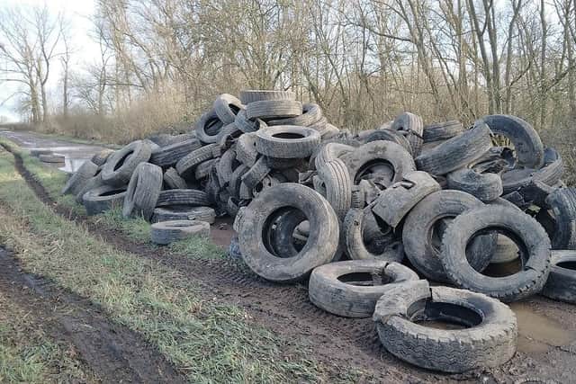 The tyres were dumped alongside the River Nene in Whittlesey.