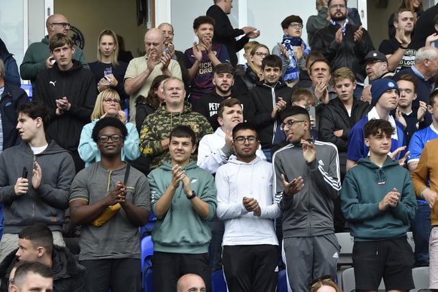 Peterborough United fans are pictured enjoying the win over Bristol Rovers.