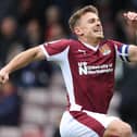 Sam Hoskins celebrates his 100th goal for Cobblers. (Photo by Pete Norton/Getty Images)