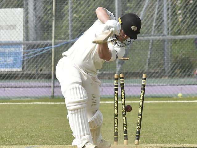 Peterborough Town's Alex Mitchell is clean bowled during the game with Witham. Photo: David Lowndes.