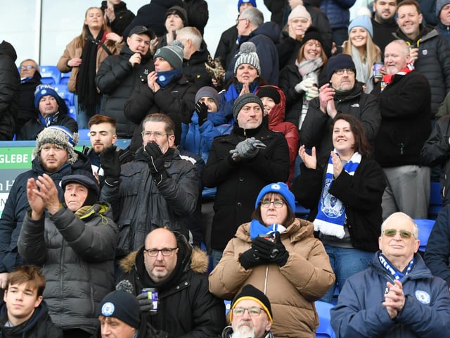 Peterborough United fans take in the win over Shrewsbury Town.
