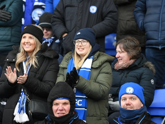 Peterborough United fans take in the win over Shrewsbury Town.