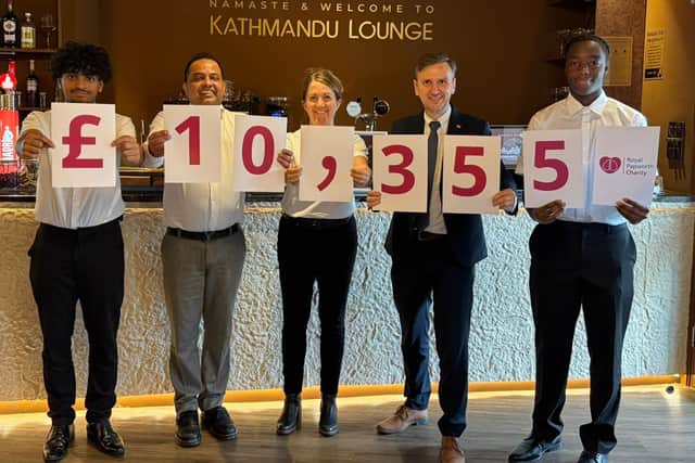 Kris (second left) at Kathmandu Lounge after his fundraiser earlier this year which raised £10, 355