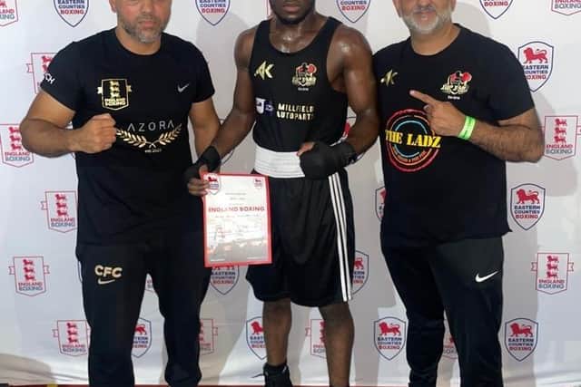 Amat Jobe with coaches Bilal Javed (left) and Akif Shirazi (right).